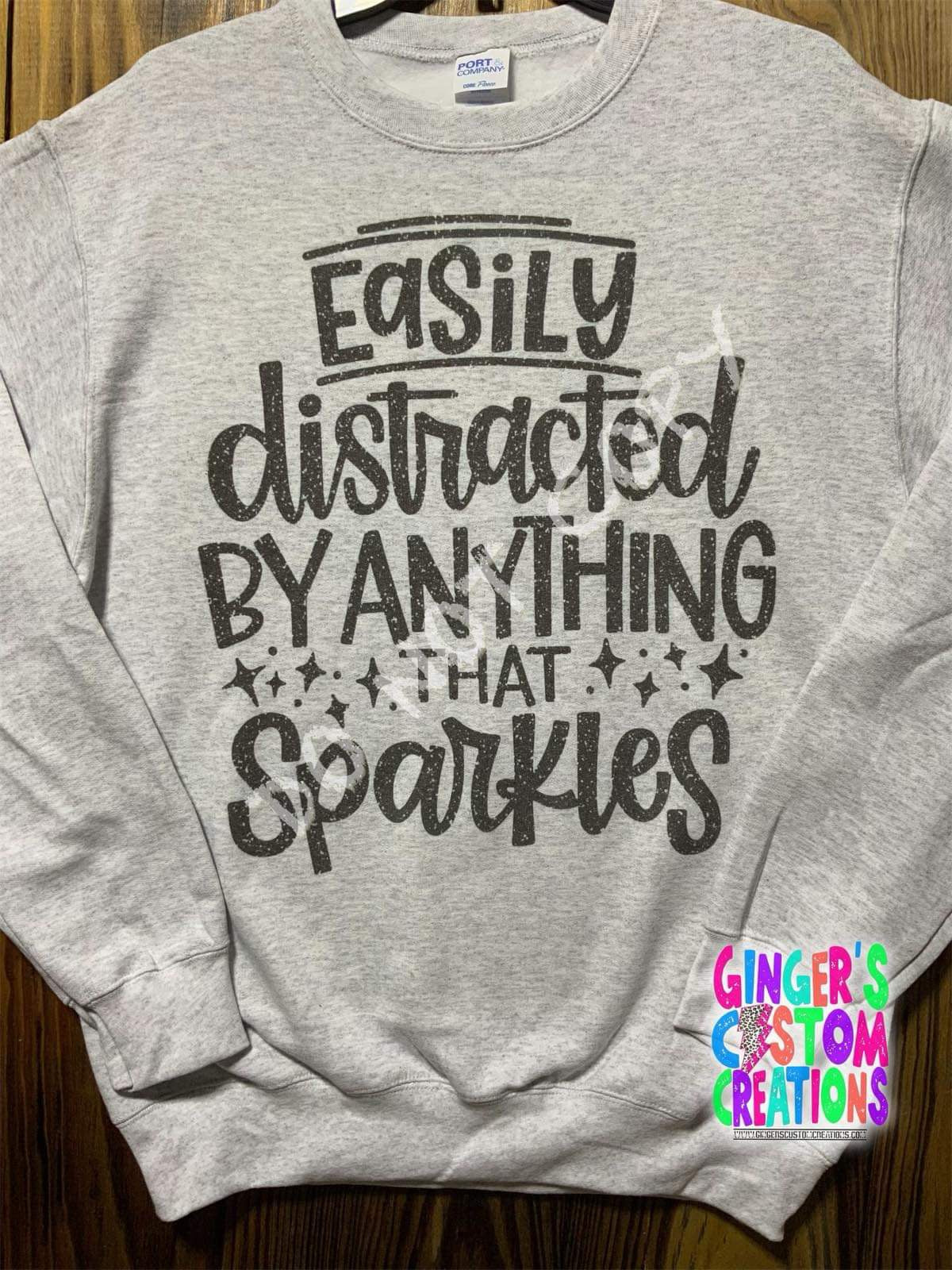 EASILY DISTRACTED BY ANYTHING THAT SPARKLES CREWNECK
