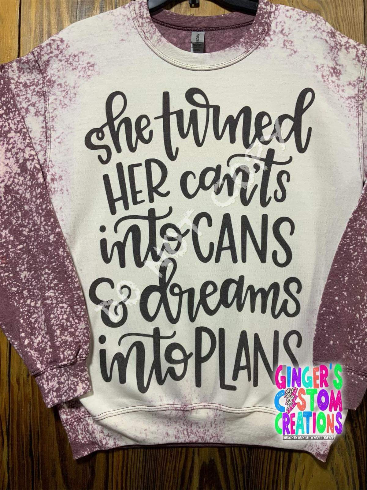 SHE TURNED HER CANTS INTO CANS AND DREAMS INTO PLANS CREWNECK